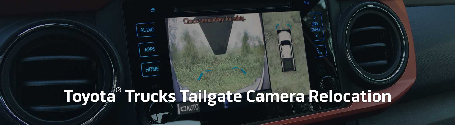 An image showing the in-dash monitor of a Toyota truck. The in-dash monitor shows that the truck is in reverse and is displaying both the backup camera and video from the cameras on the front and side of the truck. The image has text that reads Toyota Trucks Tailgate Camera Relocation.