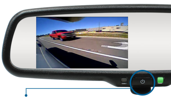 The Quick-Touch button on the face of RearSight mirrors can be help to power on auxiliary cameras such as those installed for blindspot or front-view vision