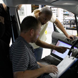 Reading data from the vehicle CAN bus system with specialized software.