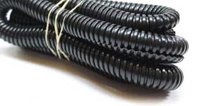 Convoluted tubing protects the main video and power harness from damage