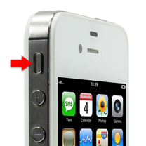 The side of an iPhone with an arrow pointing at the switch to mute and unmute the audio