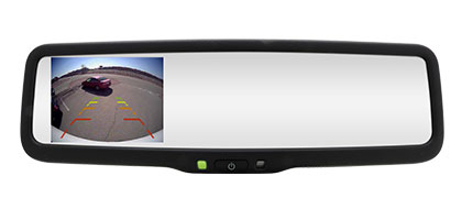 An image showing the rear view mirror of a vehicle. The mirror has an LCD screen built in to display video from a camera when the vehicle is shifted into reverse.